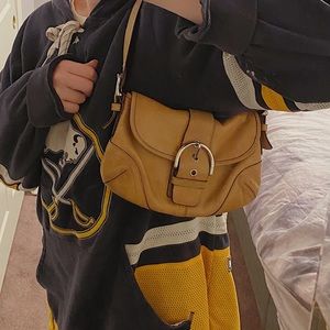 Coach light brown large buckle bag